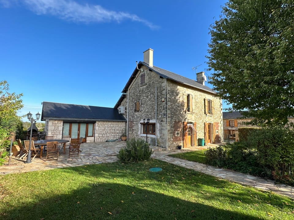 Main house & pool table room with outside patio & garden. 
