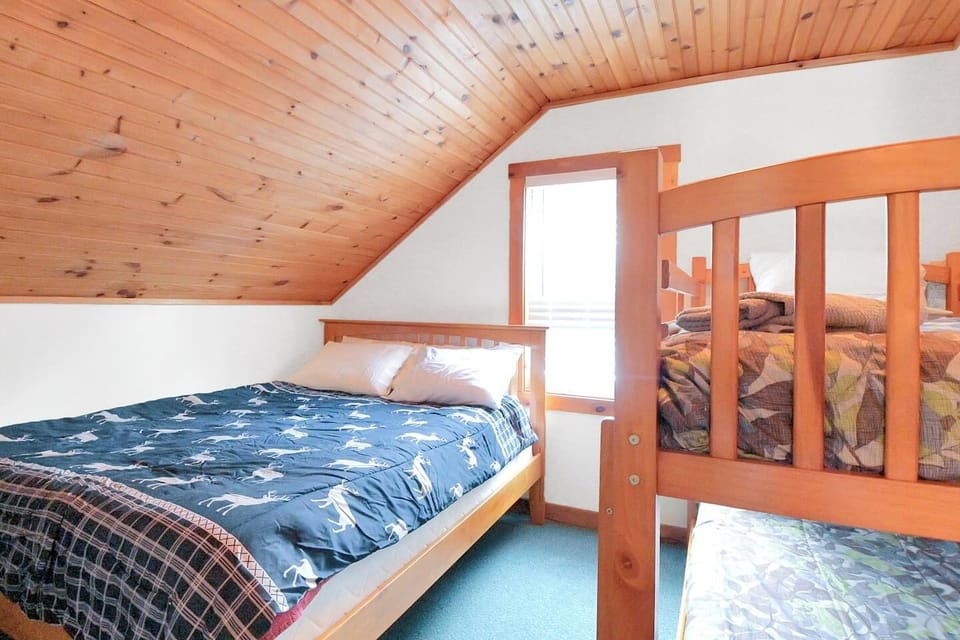 The third bedroom on the second floor of the main home offers plenty of clothing storage for the family on your stay! 