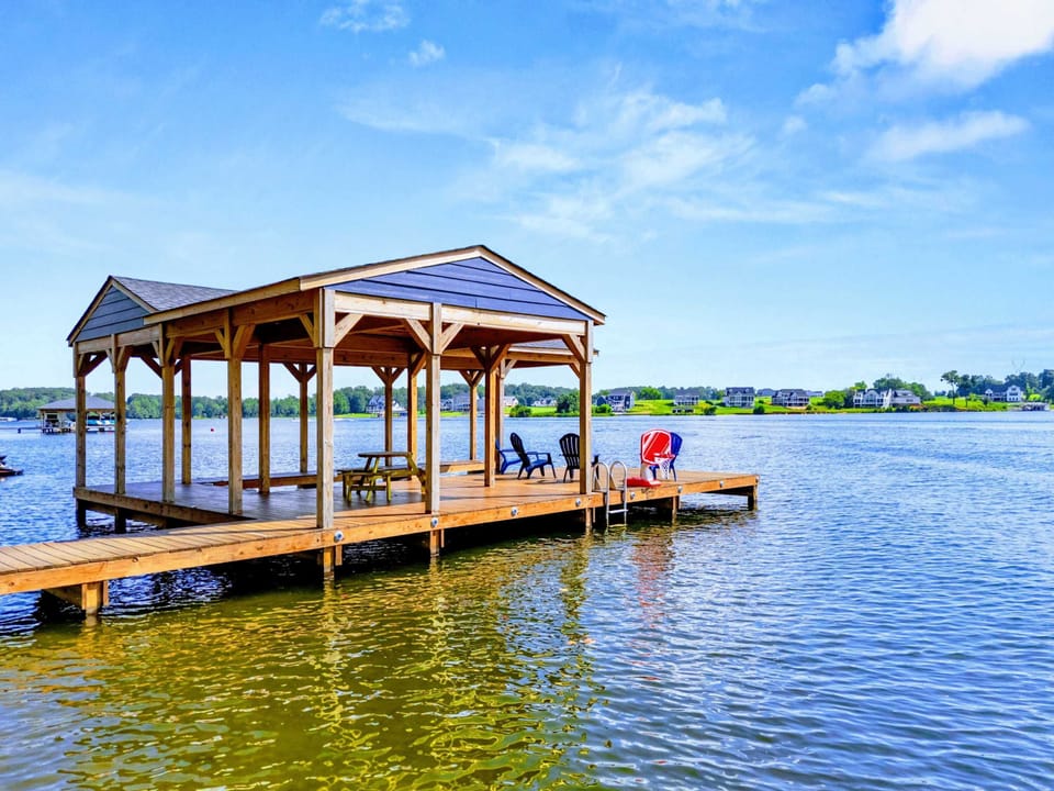 Private Dock - Covered gazebo, Adirondack seating, swim ladder, and a basketball hoop turn this dock into the center of every lake day.