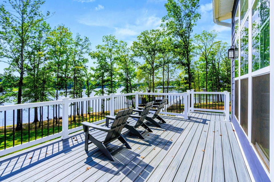 Upper Deck - Adirondack chairs and lake views set the tone for slow mornings with coffee and easy summer afternoons.