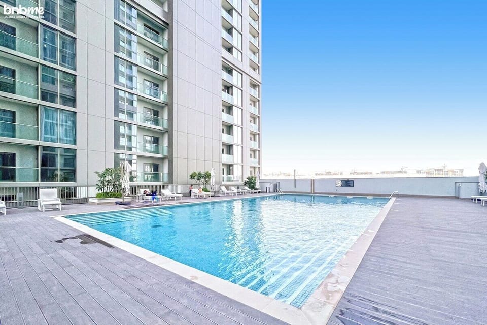 Public Pool: "Dive into relaxation in our inviting public pool, where you can soak up the sun and enjoy refreshing swims with city views."