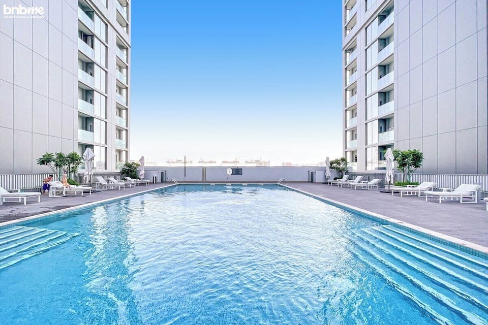 Public Pool: "Dive into relaxation in our inviting public pool, where you can soak up the sun and enjoy refreshing swims with city views."