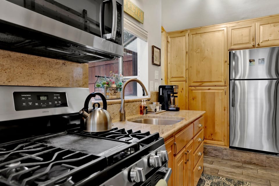 The full kitchen is equipped with basic necessities, making it easy to prepare meals during your stay.