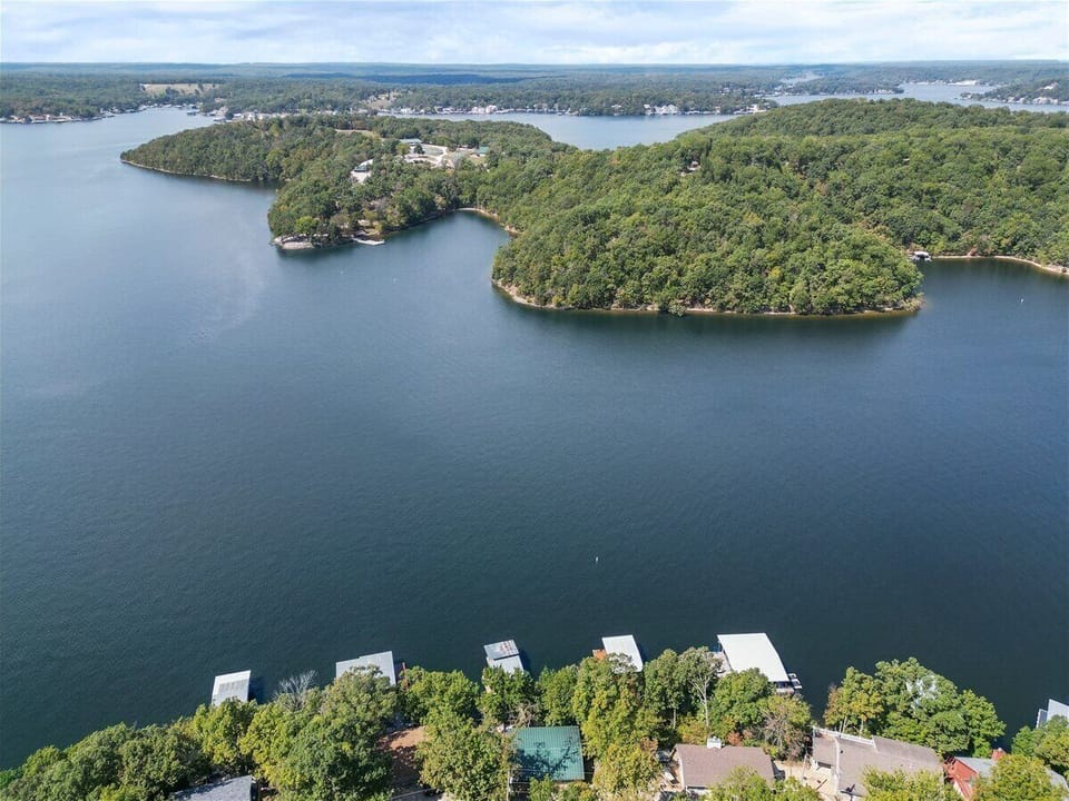 Aerial view of the lake and home