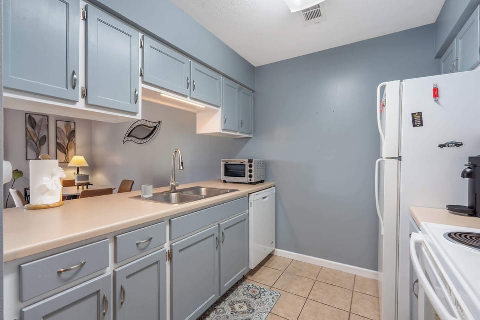 The airy kitchen offers ample space & all the comforts of home​