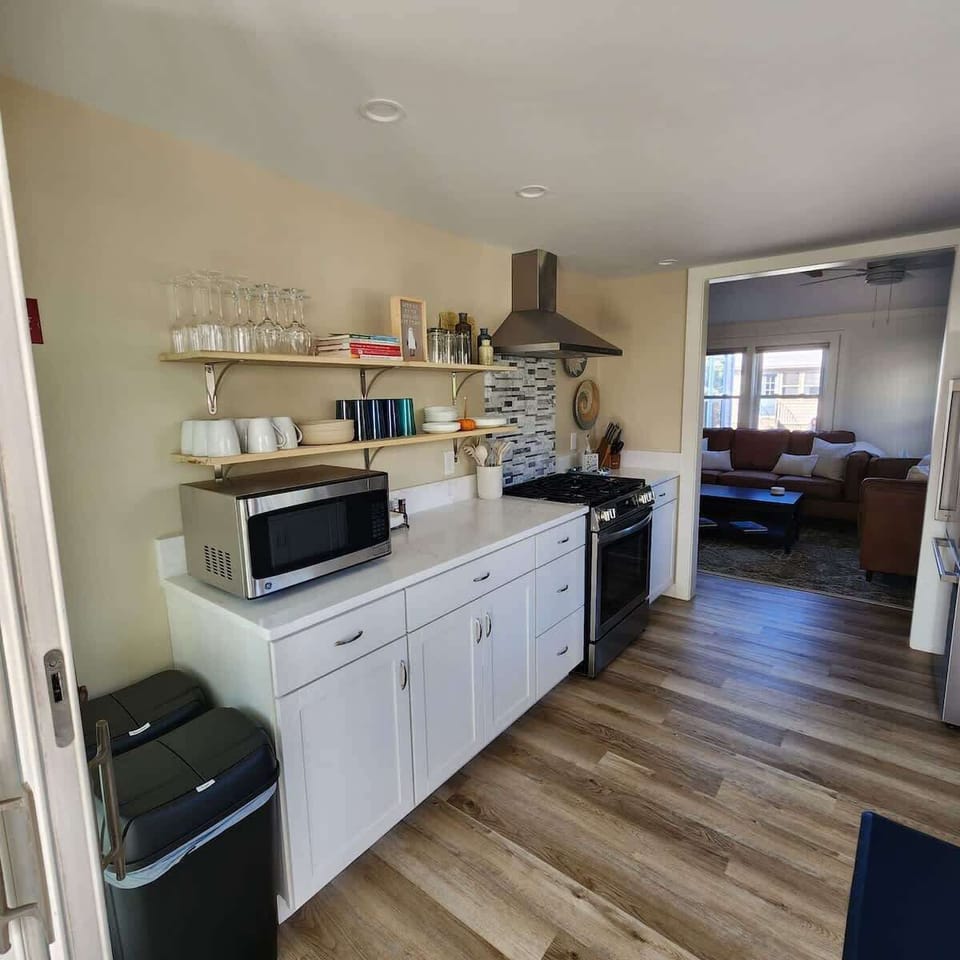 Kitchen essentials at your fingertips. Microwave, stove, refrigerator, and counter space for meal prep.