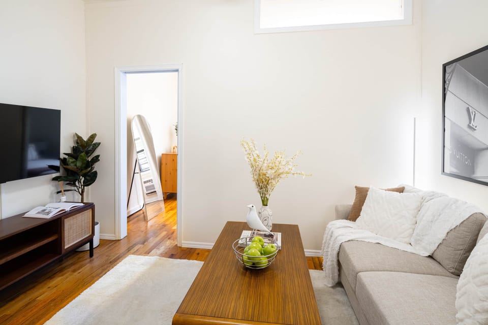 Modern living room with cozy, minimalist charm.