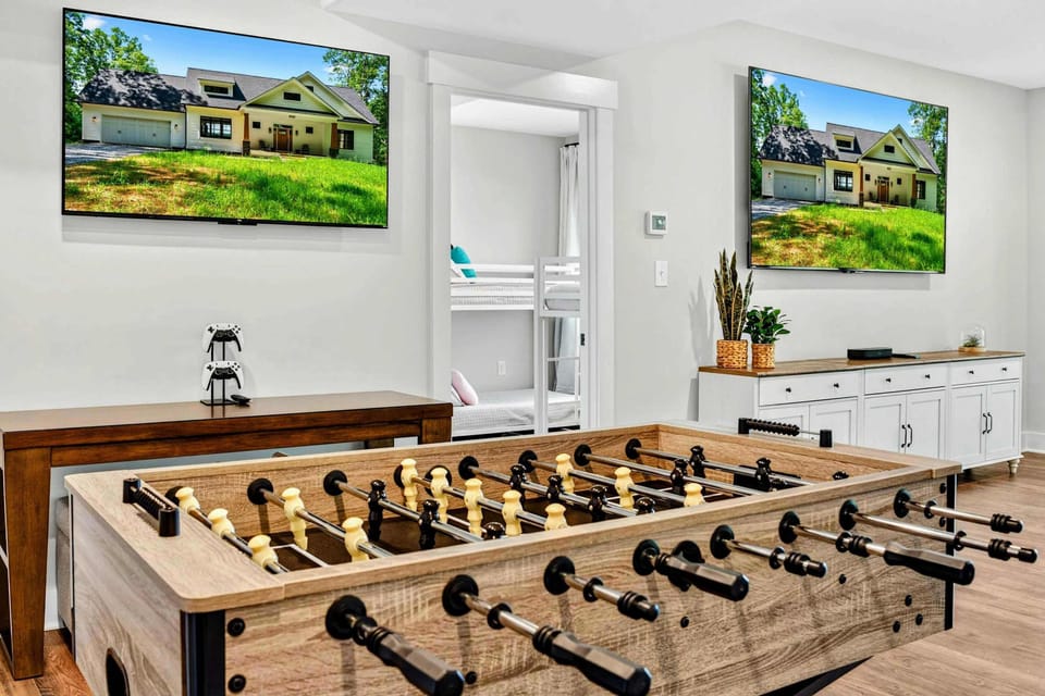 Game Room - Foosball table, dual Smart TVs, and a kitchenette keep everyone entertained on the lower level.