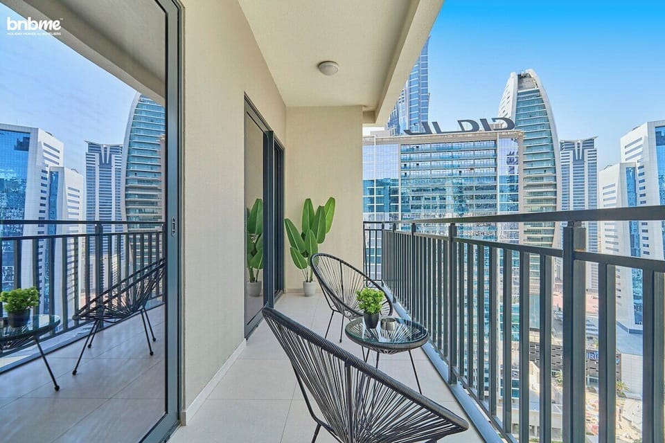 Savor the cityscape from your private balcony, a stunning backdrop for morning coffee or evening cocktails.