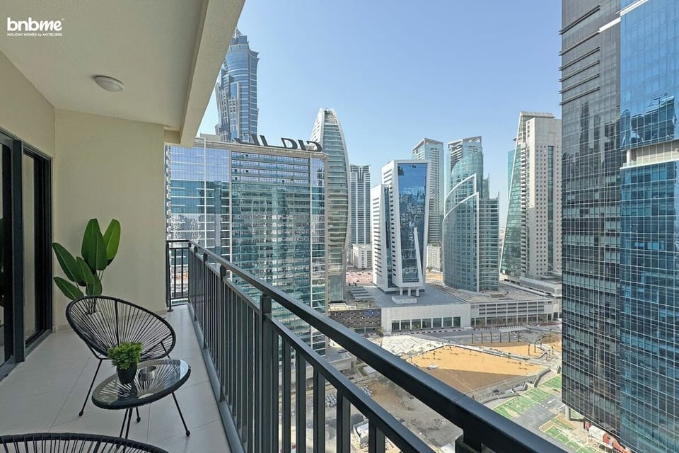 Savor the cityscape from your private balcony, a stunning backdrop for morning coffee or evening cocktails.