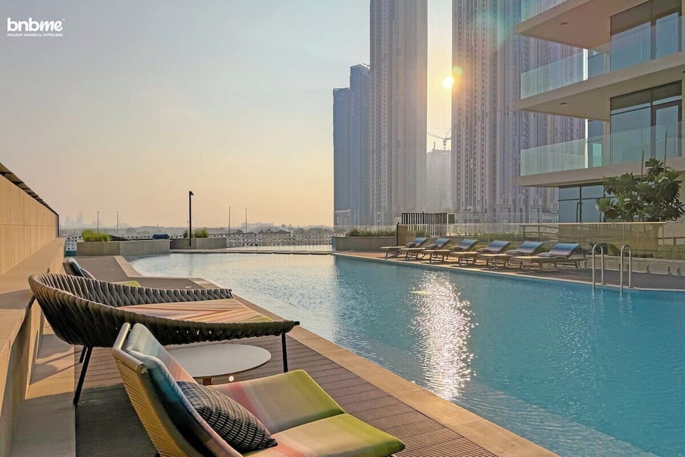 A gorgeous pool designed for leisure, surrounded by inviting seating for ultimate enjoyment.