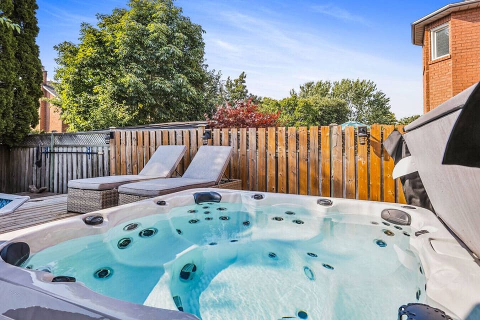 Sink into pure relaxation in your private hot tub oasis. Unwind under open skies, surrounded by lush greenery and peaceful vibes. The perfect spot to soak, sip, and let your worries drift away.