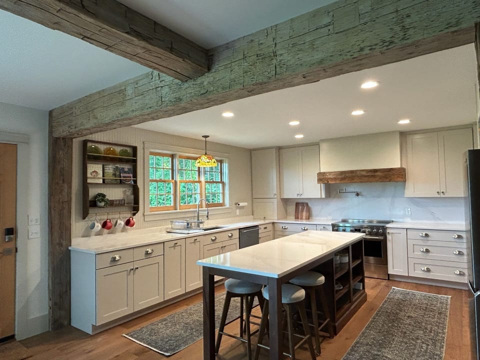 Kitchen, view 2. Mountains and farmfields are visible from the kitchen sink
