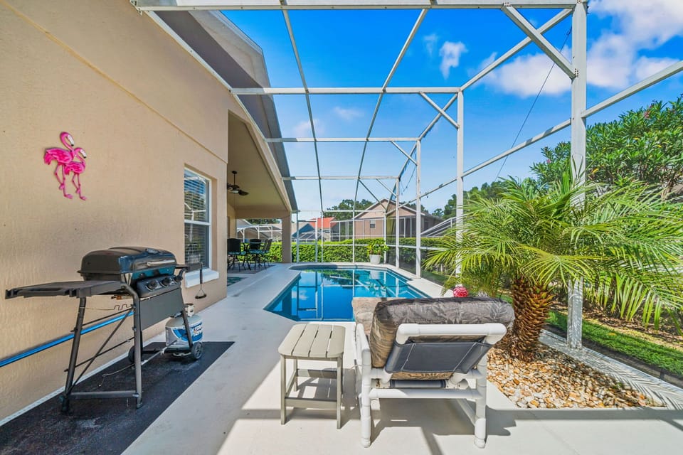 Outdoor dining set beside the pool — enjoy breakfast or dinner under the open sky