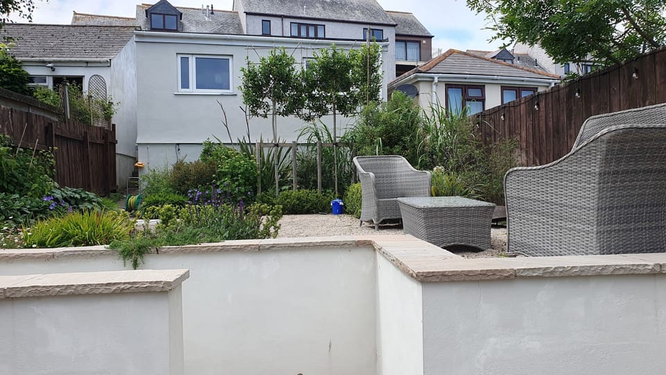 Tiered garden with sunny seating area