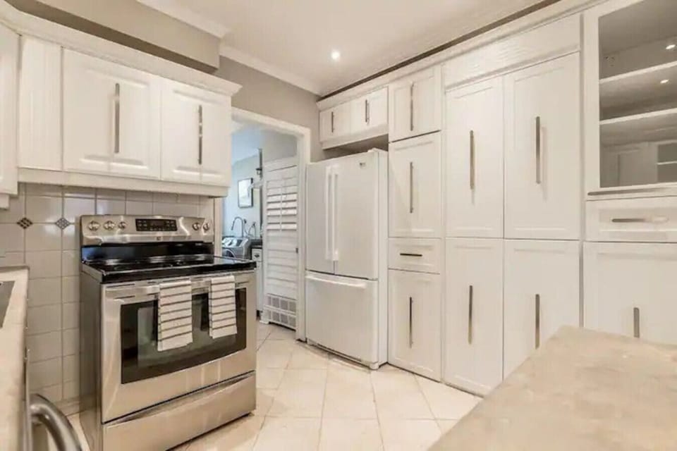 Fully stocked kitchen with appliances, cookware, and everything you need to cook at home