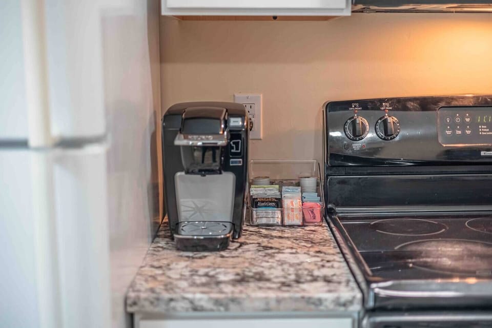 Start your day with ease using our convenient and sleek coffee machine.