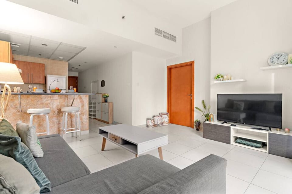 Living Room: Bright and airy space with modern decor, perfect for relaxation and entertainment!