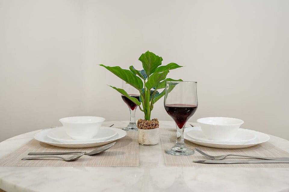 Dining Area: Savor exquisite meals surrounded by elegant decor and warm ambiance!