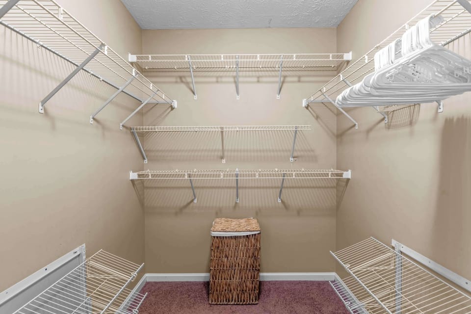 Spacious walk-in closet—perfect for extended stays, wardrobe organization, and extra comfort.