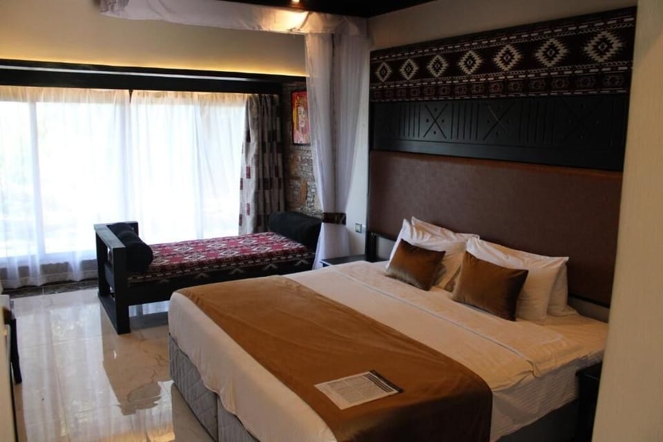 Unit with Double bed. Exact unit will be assigned upon arrival. Views, colors, and decor may vary.
