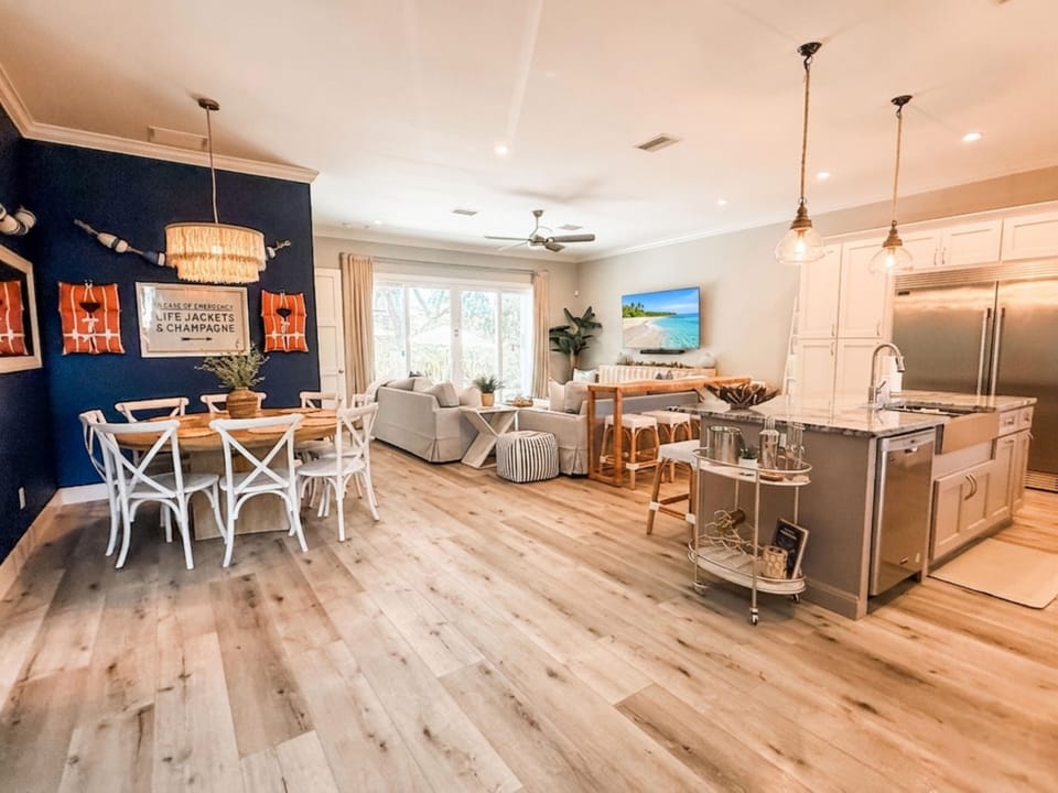 One of our favorite parts of the home ✨ The open-concept living, dining, and kitchen space gives everyone room to gather together comfortably — perfect for family meals, conversations, game nights, and making memories without ever feeling cramped.