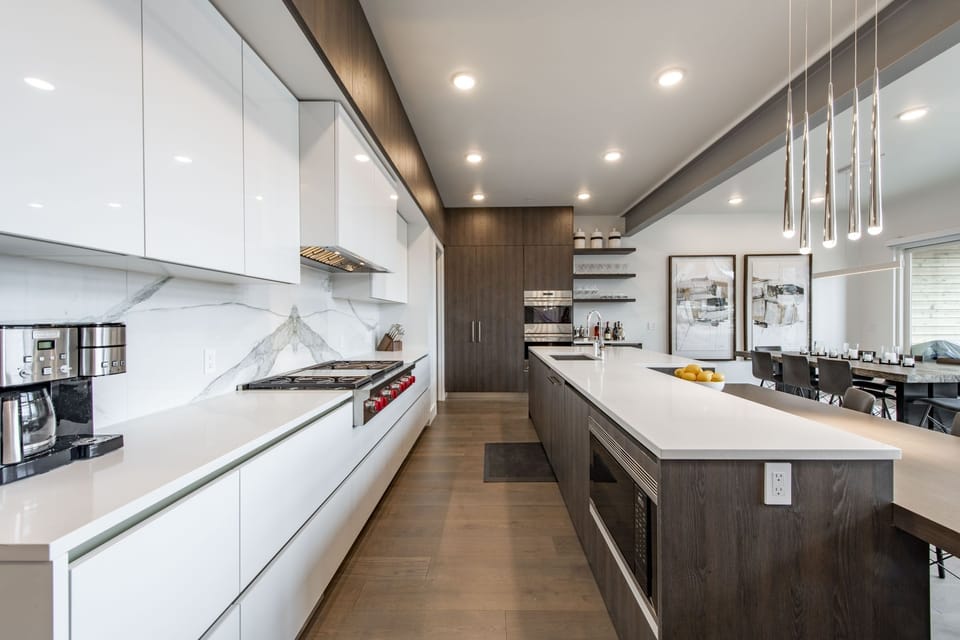 Kitchen provides plenty of counter space for meal prep and Wolf appliances.