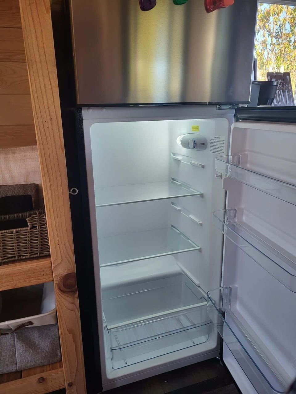 Fidge is larger than you'd find in a standard hotel room. Capacity is enough for 4 or 5 days of food.