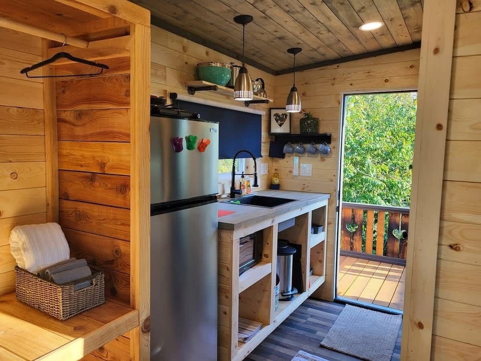 Closet shown here on the left. You can either hang clothes, or bring your monitor and laptop and use it as a work desk.