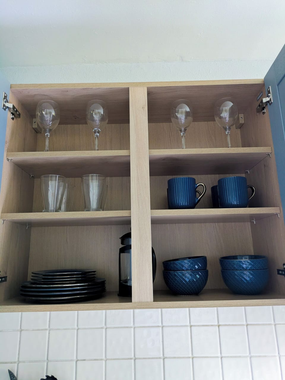 spacious kitchen, coffee machine, fridge, microwave, stove, toaster, oven