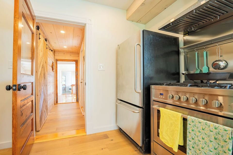 The kitchen of the addition connects to the renovated 1880s Fishermans Cape.