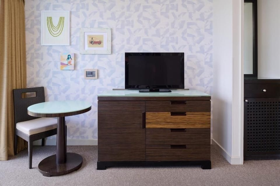 Settle in with cozy seating, TV time, and coffee.