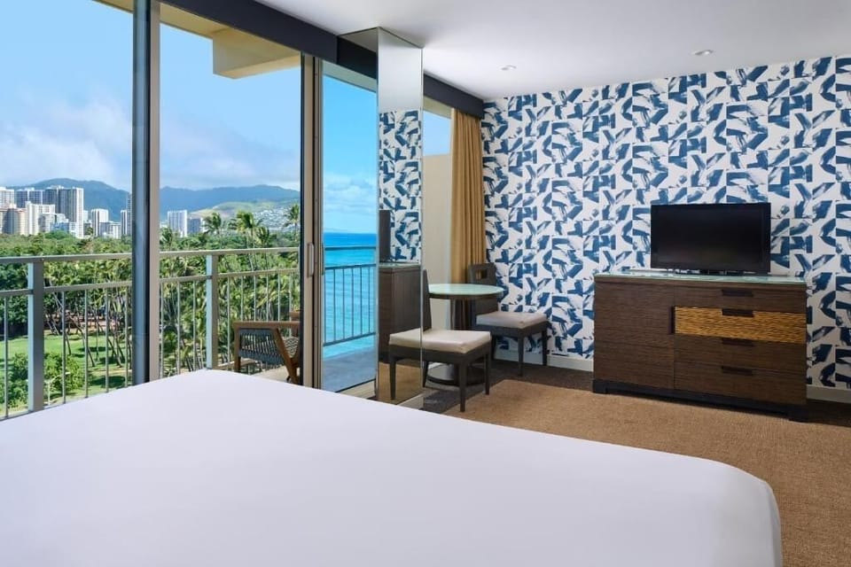 Unwind with sunset views and cozy in-room lounging.