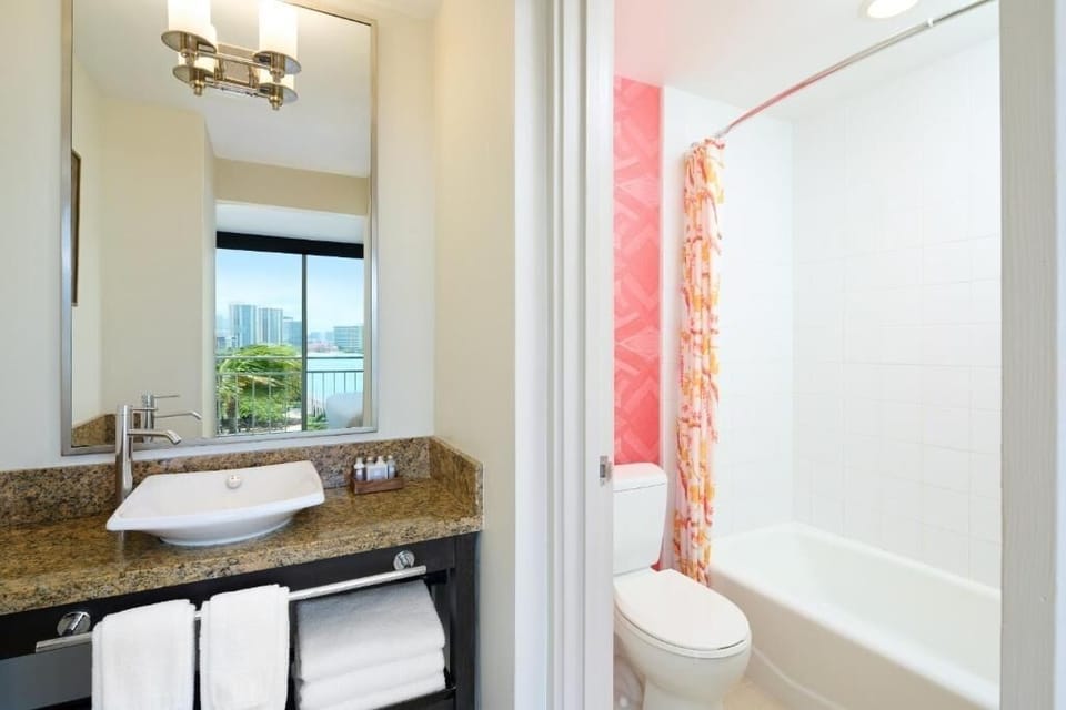 Start your day with plush towels and bright vanity space.