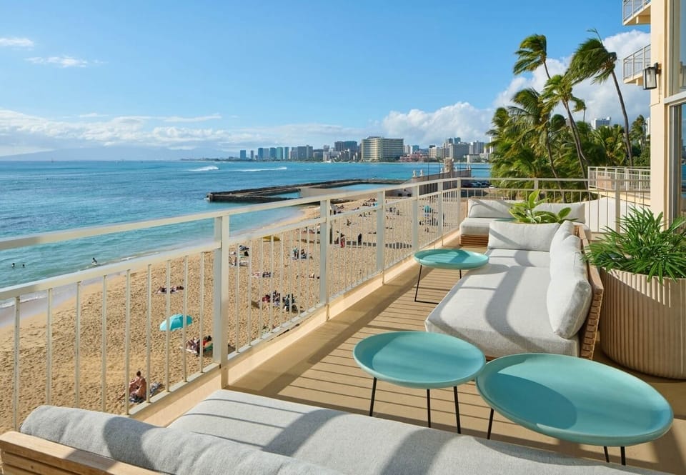 Wake up to beachfront views from sun loungers and sea breeze.