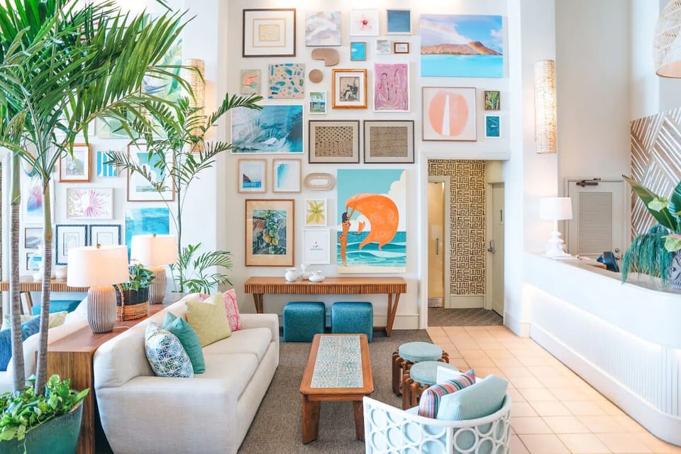 Unwind in a bright lounge surrounded by playful local art.