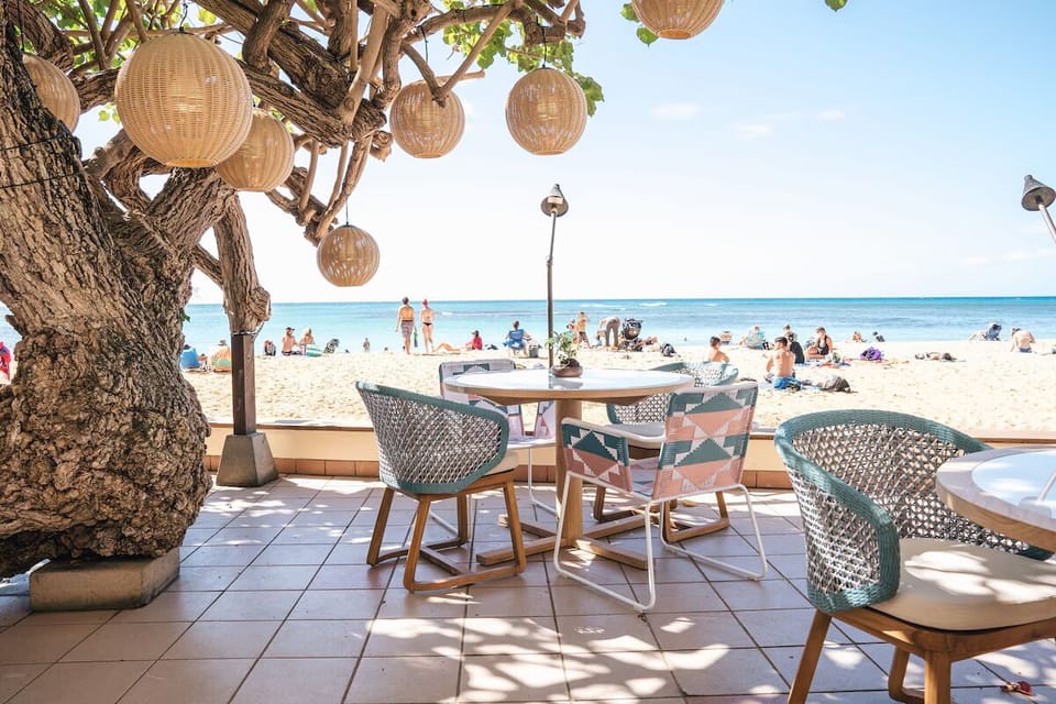 Enjoy beachfront bites with your toes nearly in the sand.