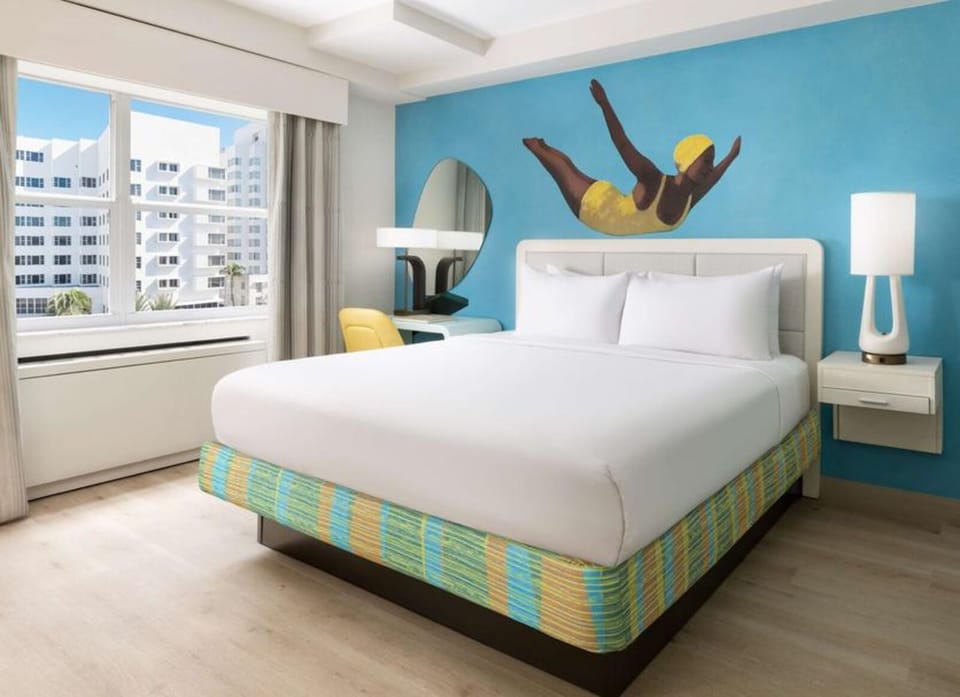 Wake up to sunshine and city views from bed.