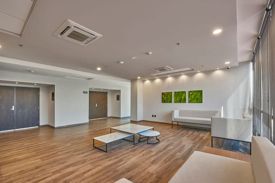 Breathe easy in a spacious lobby with relaxed seating.