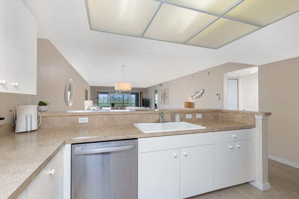 Modern kitchen with built-in dishwasher.