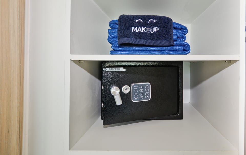 Safe in master bedroom and beach towels in both rooms