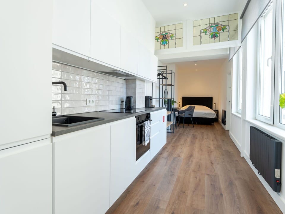 Flooring, Interior Design, Floor, Ceiling, Kitchen, Apartment, Countertop, Room, Furniture, Wood Flooring