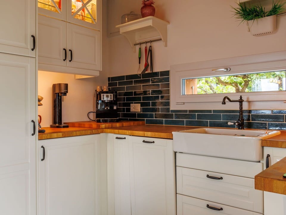 Kitchen, Countertop, Kitchen Appliance, Cabinetry, Interior Design, Wall, Wood, Major Appliance, Flooring, Furniture