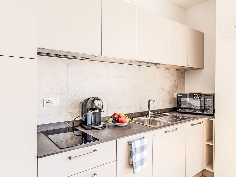Kitchen, Kitchen Appliance, Countertop, Interior Design, Cabinetry, Major Appliance, Furniture, Flooring, Wood, Kitchen Sink