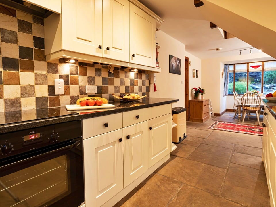 Kitchen, Kitchen Appliance, Countertop, Interior Design, Flooring, Cabinetry, Furniture, Wood, Major Appliance, Ceiling