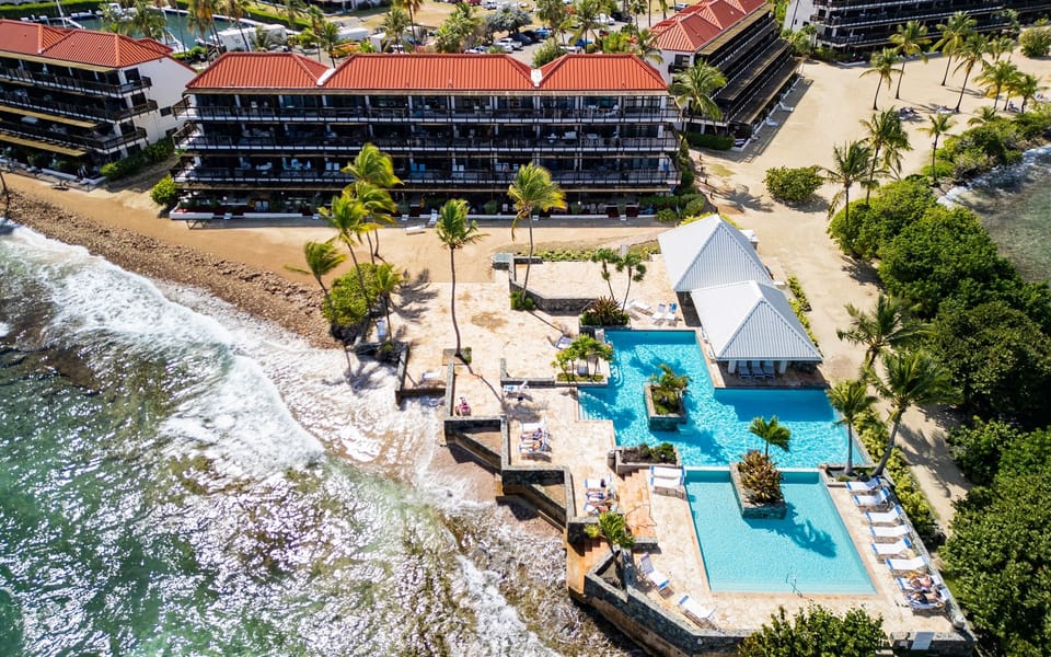 Resort-style living with pool, beach, and breathtaking views