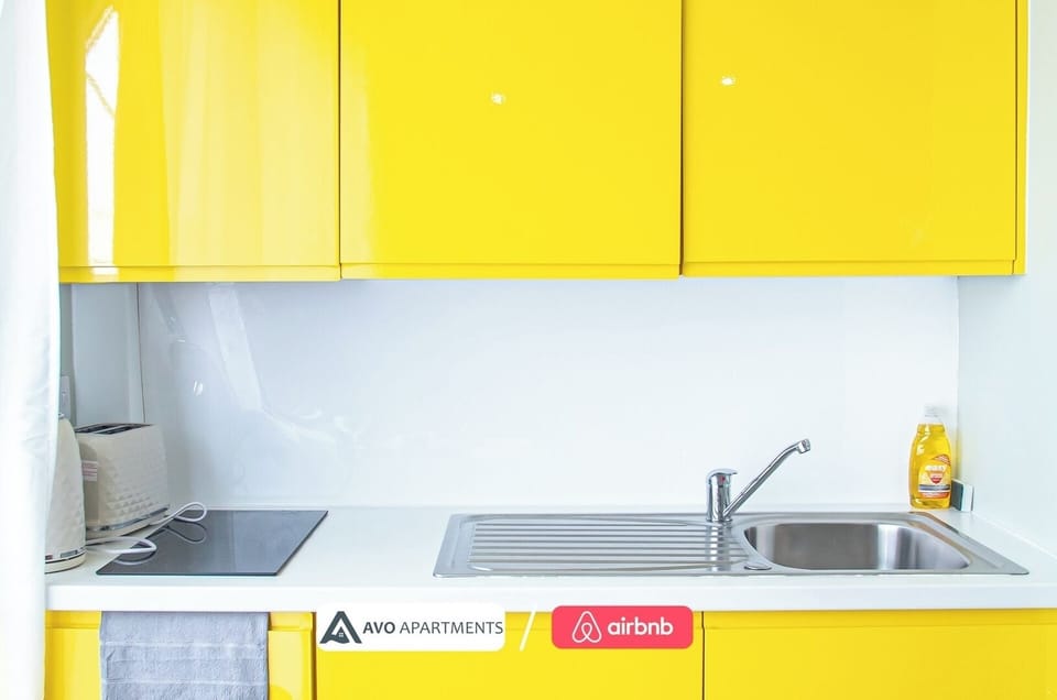 Kitchen at Avo Apartments Short Lets & Serviced Accommodation