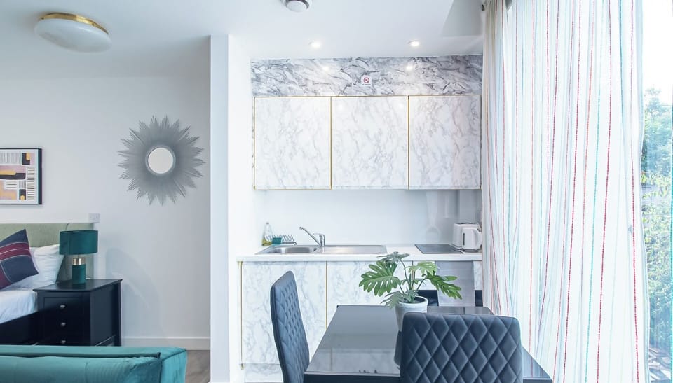 Kitchen & Dining at Avo Apartments Short Lets & Serviced Accommodation