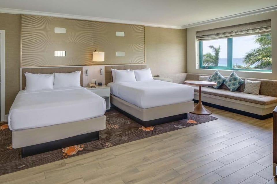 Unit with 2 Double beds. Exact unit will be assigned upon arrival. Views, colors, and decor may vary.