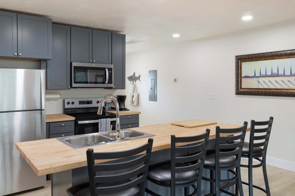Kitchen with view of the living room